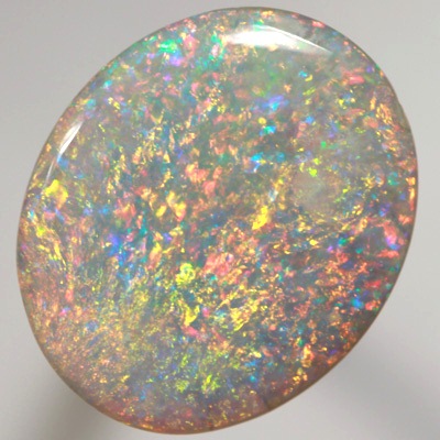 SOLID SEMI BLACK OPAL Top quality. Floral Harlequin pattern, very bright and sparkling multicolour. SEE VIDEO  